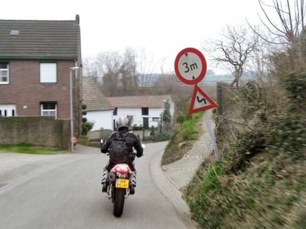 Motorcycle and two signs