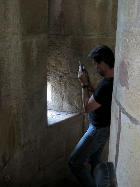 Ernst in a castle, making a photograph
