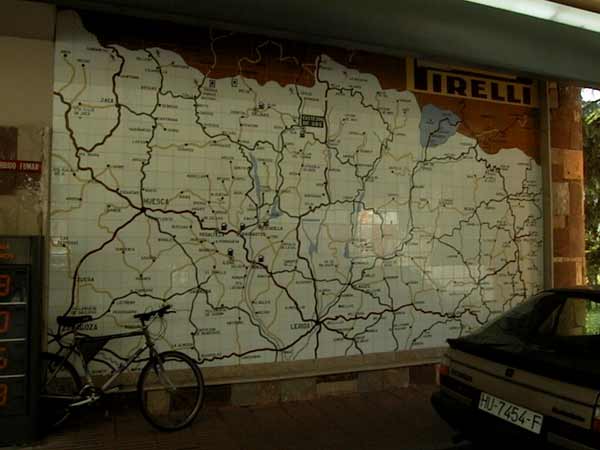 A big map in tiles at the wall on the street