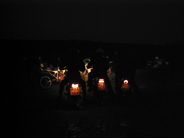 Rear lights of motorcycles in the dark